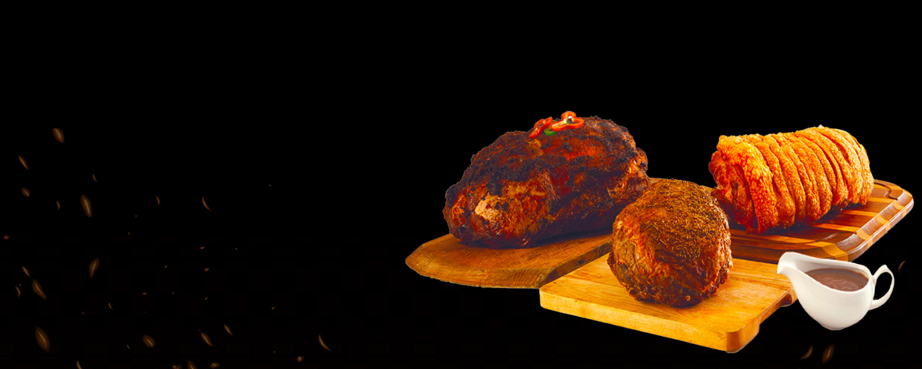 A full buffet-style catering setup with multiple roast meal options.